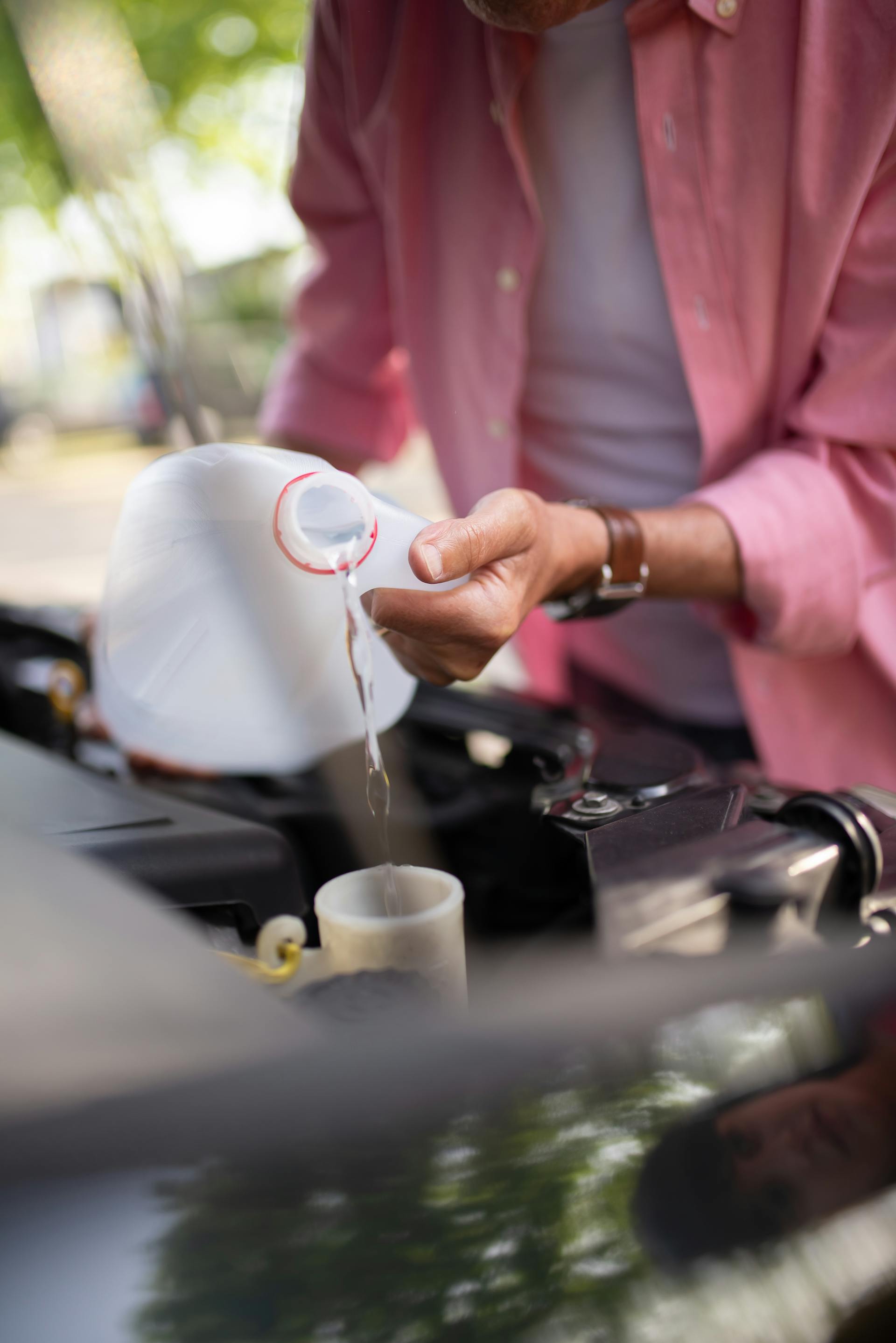 Mechanic performing mobile radiator repair outdoors in Oklahoma City